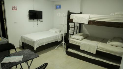 Katil atau katil-katil dalam bilik di Inn Bless Aparthotel