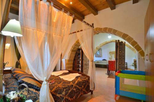 Ένα ή περισσότερα κρεβάτια σε δωμάτιο στο Maria Villas