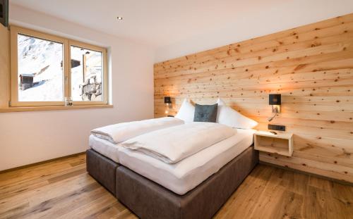 Una cama o camas en una habitación de Bildegg Appartements
