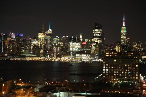 a view of a city at night with lights at Stunning Empire State 3 BR'S in Union City
