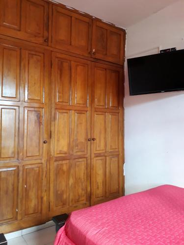 Cama o camas de una habitación en Hostal Compostela Inn