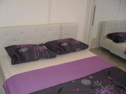 Postel nebo postele na pokoji v ubytování Apartments Govic