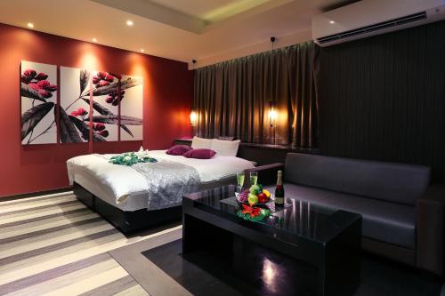 Postel nebo postele na pokoji v ubytování HOTEL 小粋 -coiki-