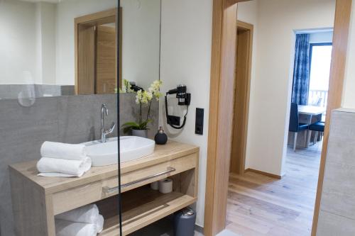 Ein Badezimmer in der Unterkunft Panorama Apart Weisses Rössl