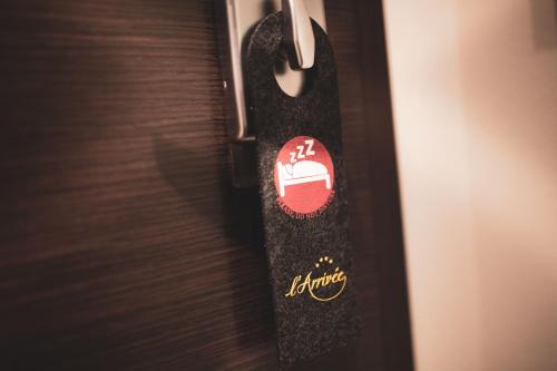 Certifikát, hodnocení, plakát nebo jiný dokument vystavený v ubytování l'Arrivée Hotel & Spa