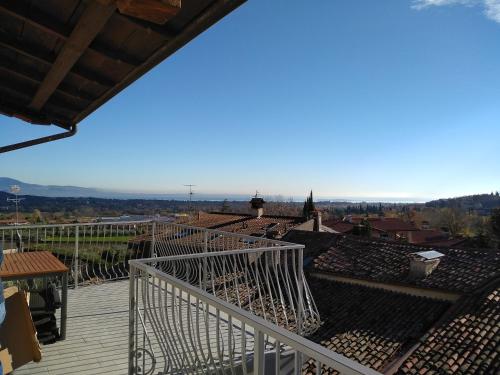 a view from the balcony of a building at "Country House il Brolo" in Polpenazze del Garda