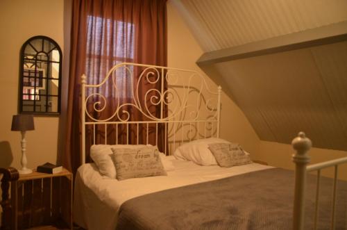 מיטה או מיטות בחדר ב-Guesthouse De Bongerd Overberg, B&B Holland, The Orchard