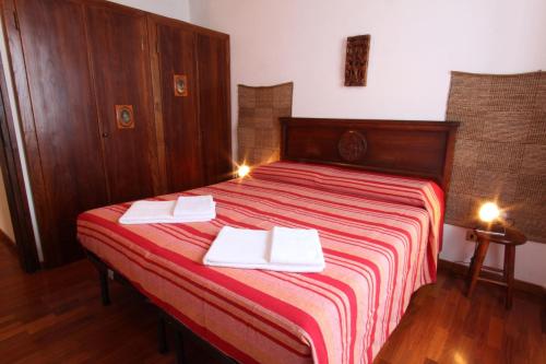Cama o camas de una habitación en Wagner apartment Bellagio