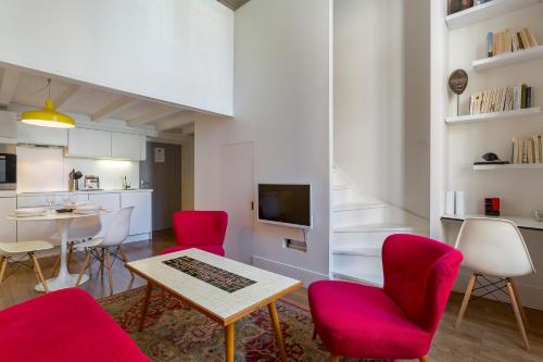 Uma área de estar em Opéra - Appartement 2beapart
