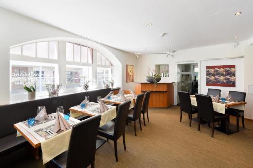 Restoran atau tempat lain untuk makan di Apart Hotel Amadeo