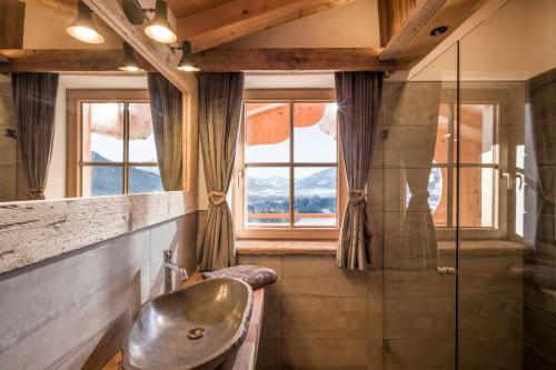Kúpeľňa v ubytovaní Chalet Apartment Obermanzl