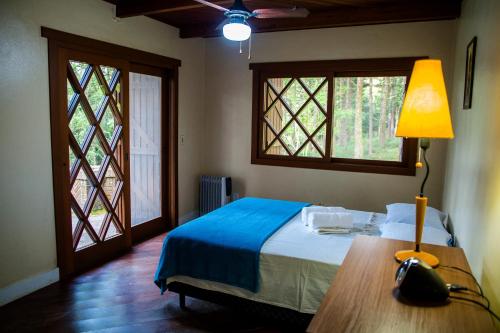 Postel nebo postele na pokoji v ubytování OM B&B + Spa
