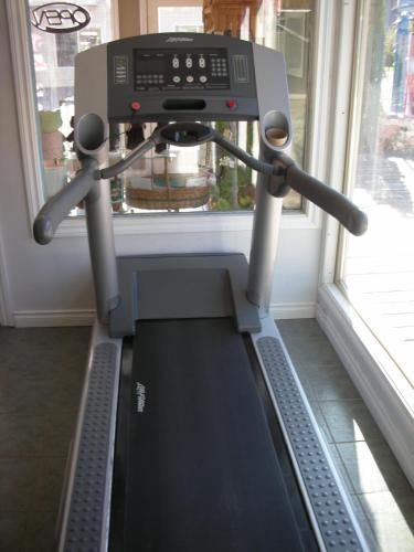 a machine sitting in front of a window at Cache Creek Inn in Cache Creek