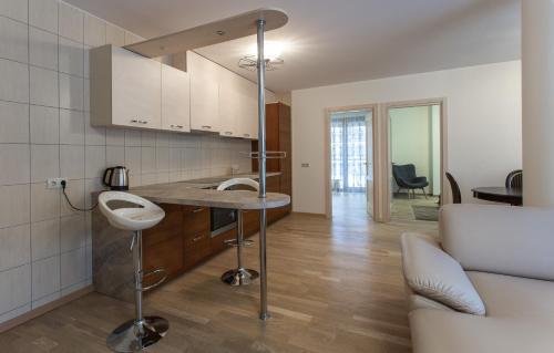 Nhà bếp/bếp nhỏ tại Violetos Lux Apartamentai