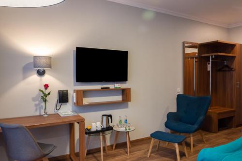 TV o dispositivi per l'intrattenimento presso Hotel Topaz Poznań Centrum