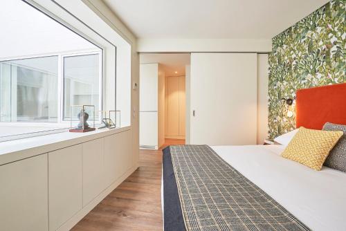 Ένα ή περισσότερα κρεβάτια σε δωμάτιο στο Lisbon Best Choice Apartments Alfama