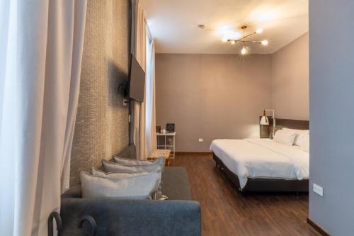 Krevet ili kreveti u jedinici u objektu Azur Real Hotel Boutique & Spa