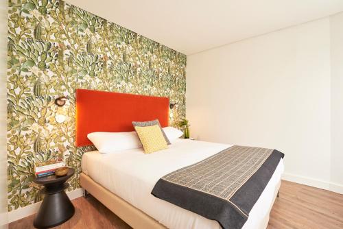 Ένα ή περισσότερα κρεβάτια σε δωμάτιο στο Lisbon Best Choice Apartments Alfama