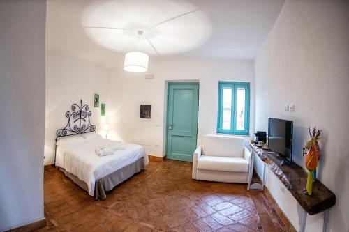 Posteľ alebo postele v izbe v ubytovaní Borgo Rosso di Sera - Resort Country Chic