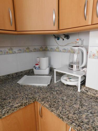 Kuchyň nebo kuchyňský kout v ubytování Sol de Tenerife
