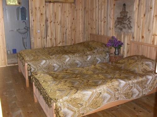 Postel nebo postele na pokoji v ubytování Guest House Mirgvela