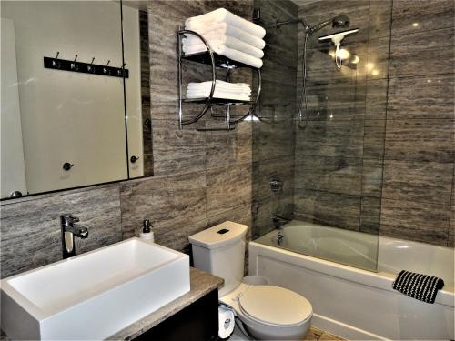 A bathroom at TVHR - Luxury Condos in Heart of Downtown