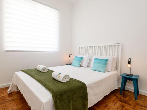 Cama o camas de una habitación en Adorável em Ipanema - Perto da praia - PM402 Z1