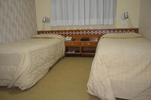 Ένα ή περισσότερα κρεβάτια σε δωμάτιο στο Hostal Santa Fe De La Veracruz