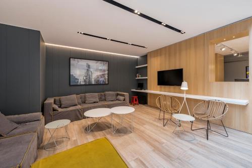 TV a/nebo společenská místnost v ubytování Puerto Limon Hostel
