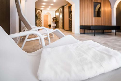 Ένα ή περισσότερα κρεβάτια σε δωμάτιο στο Residence Ciasa Giardun