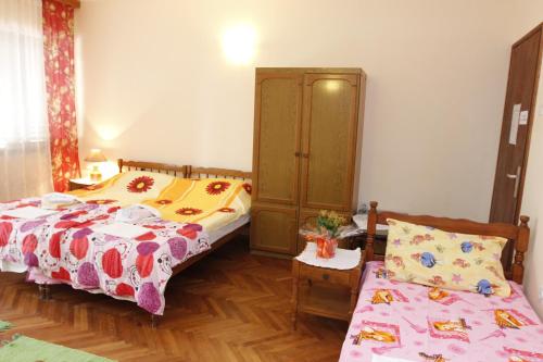 Postel nebo postele na pokoji v ubytování Guest House Olga