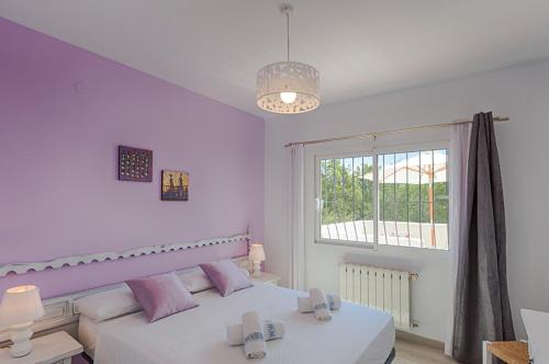 Postel nebo postele na pokoji v ubytování Villas Guzman - Milou
