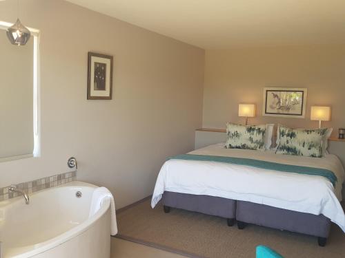 Кровать или кровати в номере Riebeek Vista