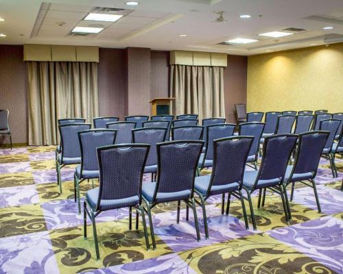a conference room with chairs and a podium in it at Comfort Suites Sanford in Sanford