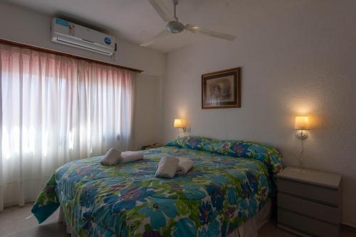 Ένα ή περισσότερα κρεβάτια σε δωμάτιο στο Hotel Victoria