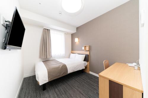 TV a/nebo společenská místnost v ubytování Pearl Hotel Shinjuku Akebonobashi