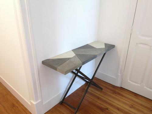a small table in a corner of a room at Monte Agudo Angola 45 in Lisbon