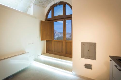 A bed or beds in a room at DiVinum