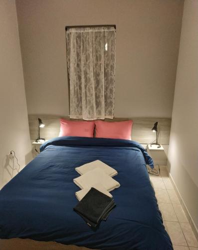 Llit o llits en una habitació de kalimera