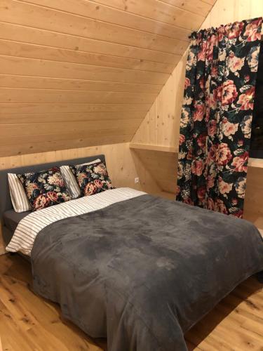 מיטה או מיטות בחדר ב-Chochołowskie Spanie