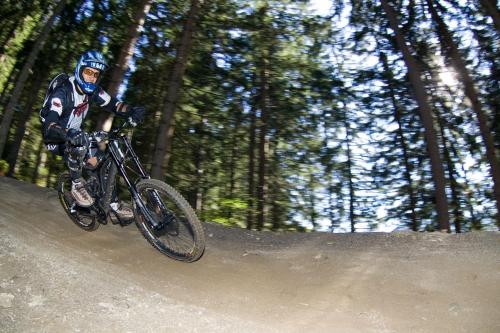 a man riding a dirt bike down a hill at Appartement Fritzenwallner in Wagrain