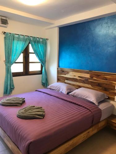 Postel nebo postele na pokoji v ubytování Green guesthouse kohchang