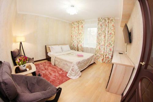 Ένα ή περισσότερα κρεβάτια σε δωμάτιο στο 1BR apartment in the centre, Nazarbaev 42A