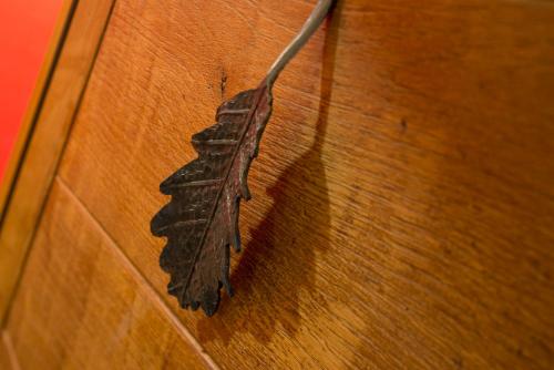 a moth sitting on top of a wooden table at Lo Tzeno in Fenis