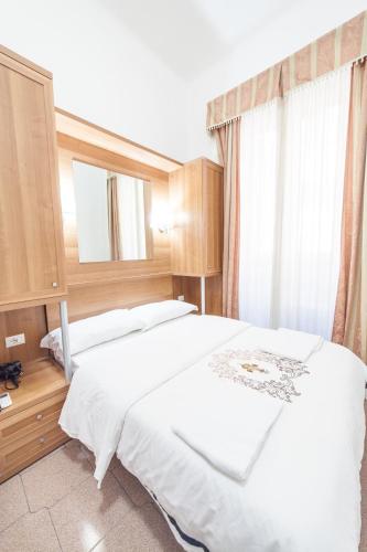 Ένα ή περισσότερα κρεβάτια σε δωμάτιο στο Lemei House