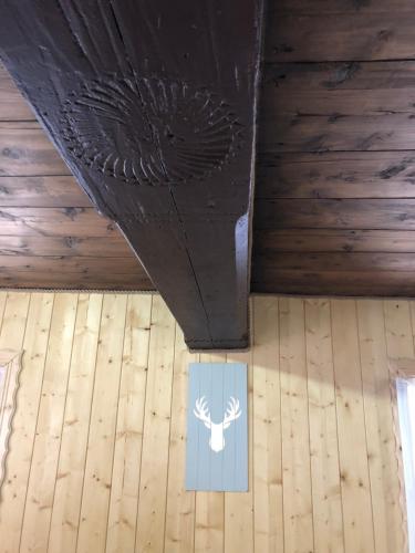 a ceiling with a picture of a moose on it at Chalet anno 1794 in Rettenegg
