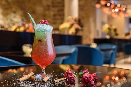 a drink sitting on top of a table at Áurea Museum by Eurostars Hotel Company in Lisbon