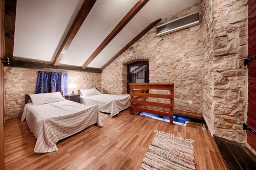 Ένα ή περισσότερα κρεβάτια σε δωμάτιο στο Villa Silente