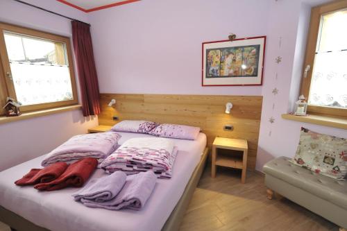 En eller flere senge i et værelse på Cà del Romeo