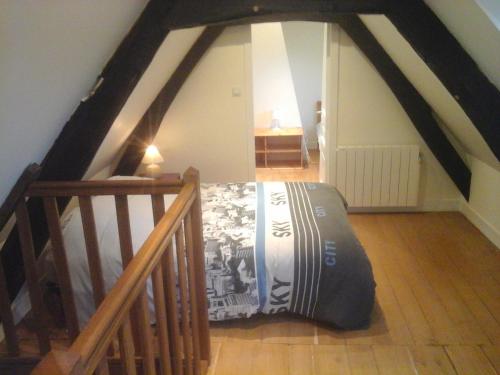 - une chambre mansardée dans l'établissement Bienvenue à la maison, à Le Theil-en-Auge